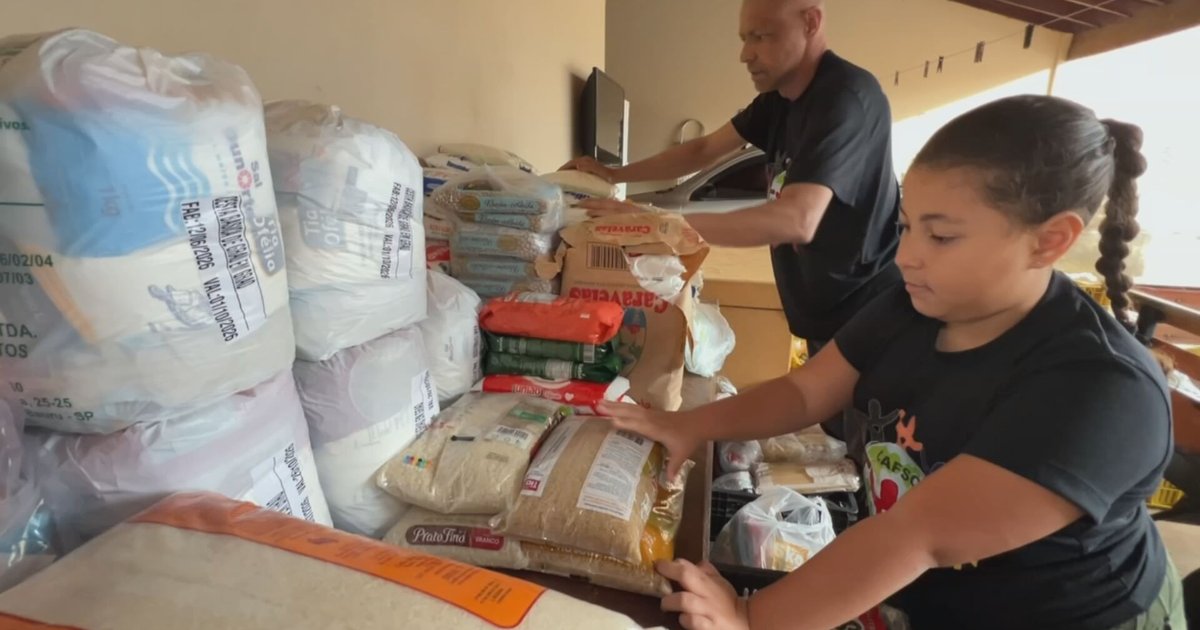 Pais e filhos transformam voluntariado em tradição de Dia dos Pais em Goiânia
