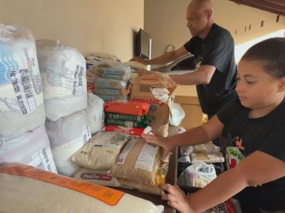 Pais e filhos transformam voluntariado em tradição de Dia dos Pais em Goiânia